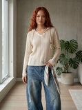 DAXUEN Long sleeve hooded top in light beige crochet fabric — model photo
