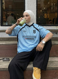 DAXUEN Men's relaxed fit short-sleeved mesh jersey top — model photo