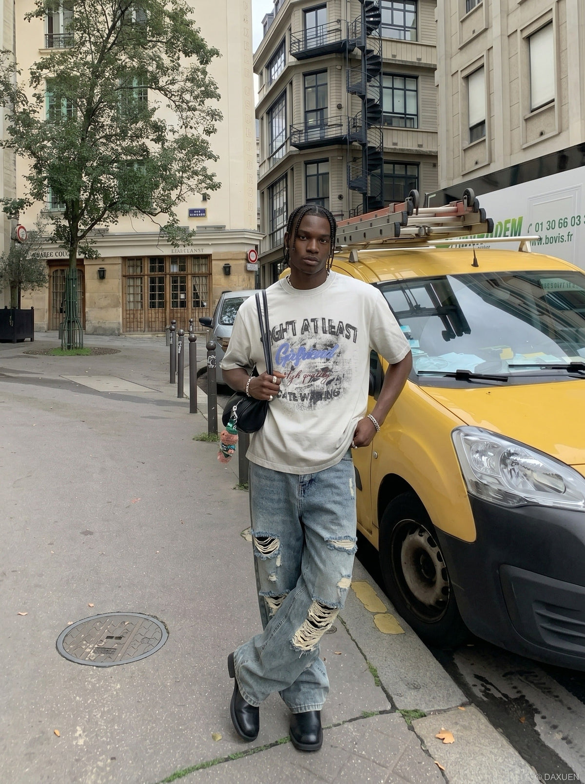 DAXUEN Distressed graphic t-shirt with bold text print — model photo