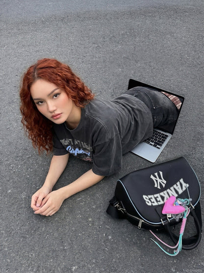 DAXUEN Distressed graphic t-shirt with bold text print — model photo