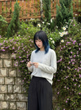 DAXUEN Long sleeve crew neck t-shirt with patch pocket — model photo
