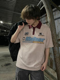 DAXUEN Striped short-sleeved polo shirt with embroidered graphics — model photo