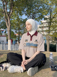 DAXUEN Striped short-sleeved polo shirt with embroidered graphics — model photo