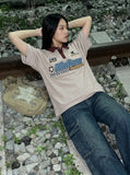 DAXUEN Striped short-sleeved polo shirt with embroidered graphics — model photo