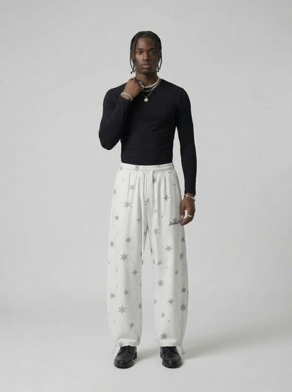 DAXUEN Wide-leg lounge pants with snowflake print — model photo
