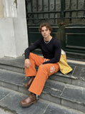 DAXUEN Loose-fitting wide-leg track pants with graphics — model photo