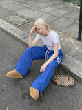 DAXUEN Loose-fitting wide-leg track pants with graphics — model photo