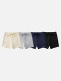 DAXUEN Set of four pairs of casual athletic shorts in solid colors