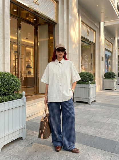 DAXUEN Cream striped button-up shirt with short sleeves — model photo
