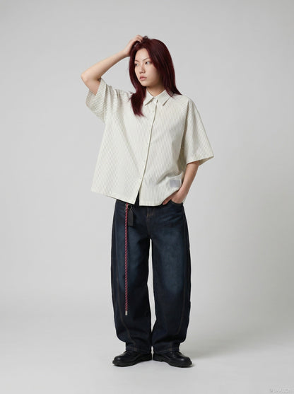 DAXUEN Cream striped button-up shirt with short sleeves — model photo