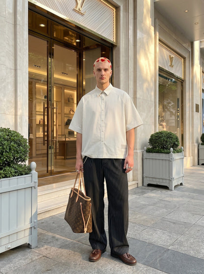 DAXUEN Cream striped button-up shirt with short sleeves — model photo