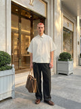 DAXUEN Cream striped button-up shirt with short sleeves — model photo