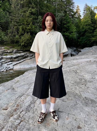 DAXUEN Cream striped button-up shirt with short sleeves — model photo