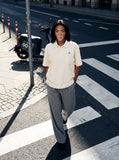 DAXUEN Oversized short-sleeve polo shirt with pocket — model photo