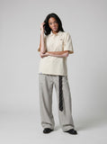 DAXUEN Oversized short-sleeve polo shirt with pocket — model photo