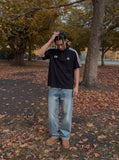DAXUEN Relaxed-fit short sleeve polo shirt with stripes — model photo