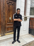 DAXUEN Relaxed-fit short sleeve polo shirt with stripes — model photo