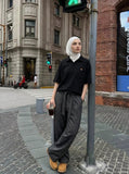 DAXUEN Short-sleeved polo shirt in light grey melange and black — model photo