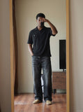 DAXUEN Short-sleeved polo shirt in light grey melange and black — model photo