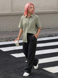 DAXUEN Textured short-sleeved button-up shirt — model photo