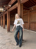 DAXUEN White oversized graphic t-shirt with unique print — model photo