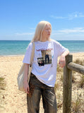 DAXUEN White oversized graphic t-shirt with unique print — model photo