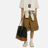 DAXUEN Wide-leg cuffed shorts with striped liner