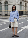 DAXUEN Wide-leg cuffed shorts with striped liner — model photo