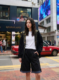 DAXUEN Wide-leg cuffed shorts with striped liner — model photo