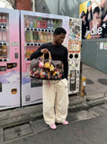 DAXUEN Wide-leg sweatpants with playful prints and embroidery — model photo
