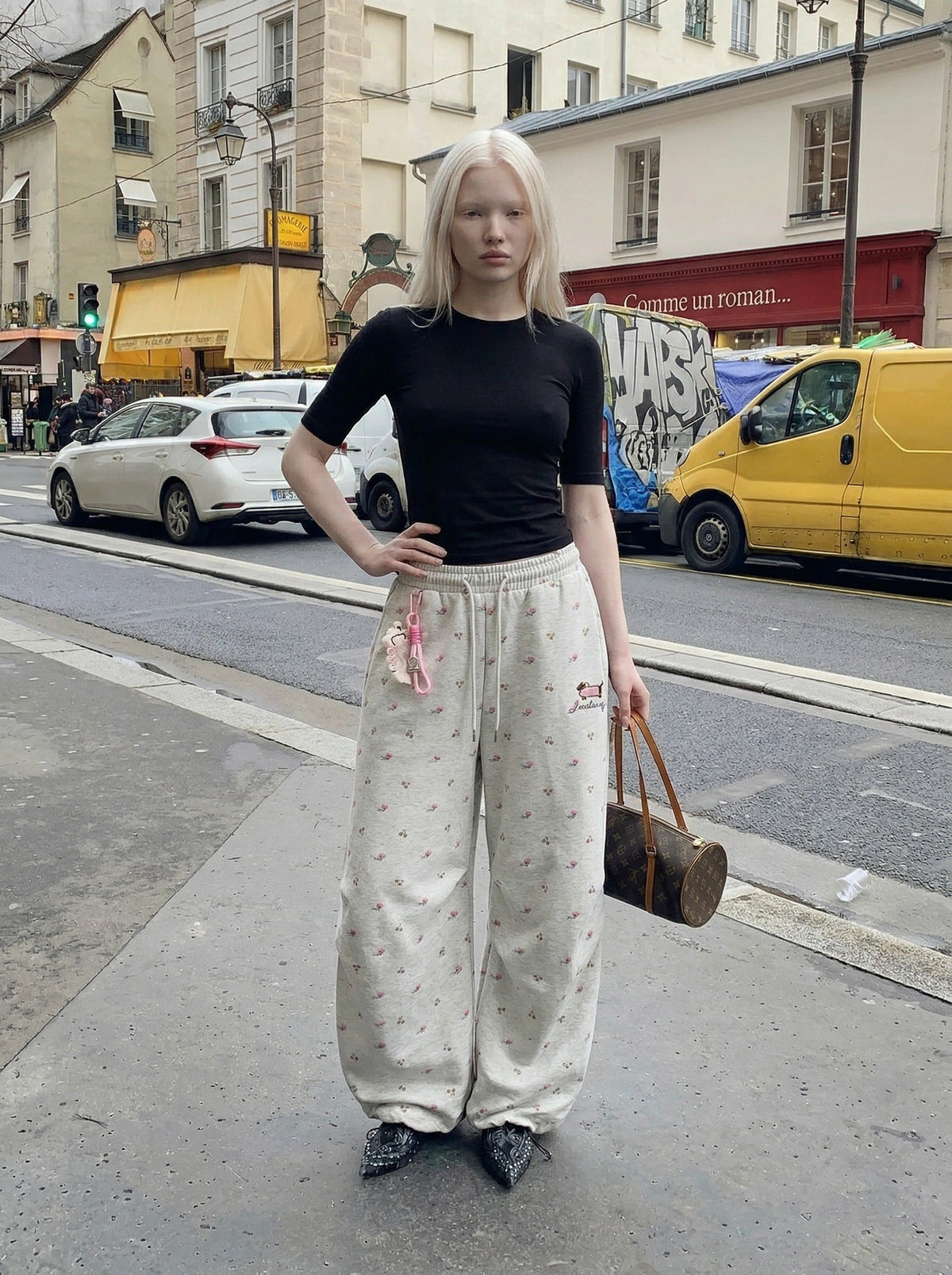 DAXUEN Wide-leg sweatpants with playful prints and embroidery — model photo