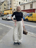 DAXUEN Wide-leg sweatpants with playful prints and embroidery — model photo