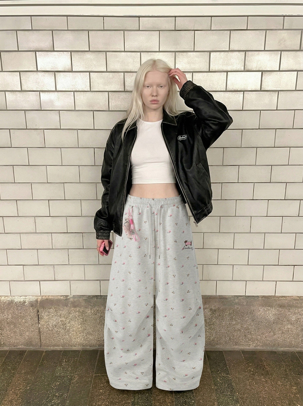 DAXUEN Wide-leg sweatpants with playful prints and embroidery — model photo