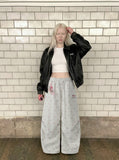 DAXUEN Wide-leg sweatpants with playful prints and embroidery — model photo