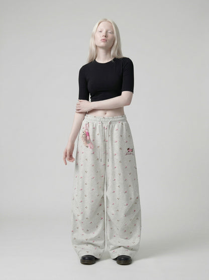 DAXUEN Wide-leg sweatpants with playful prints and embroidery — model photo