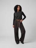 DAXUEN Casual wide-leg pants in light grey and washed black — model photo