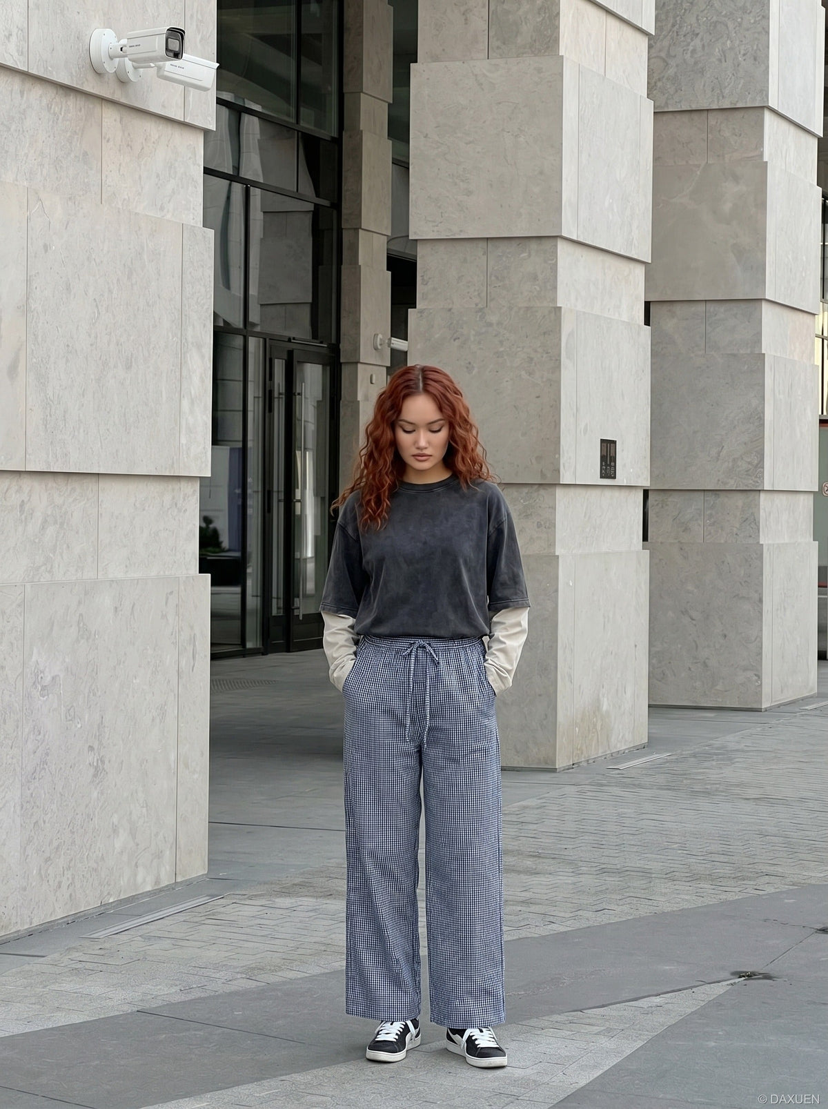 DAXUEN Wide-leg gingham pants with elastic waistband — model photo
