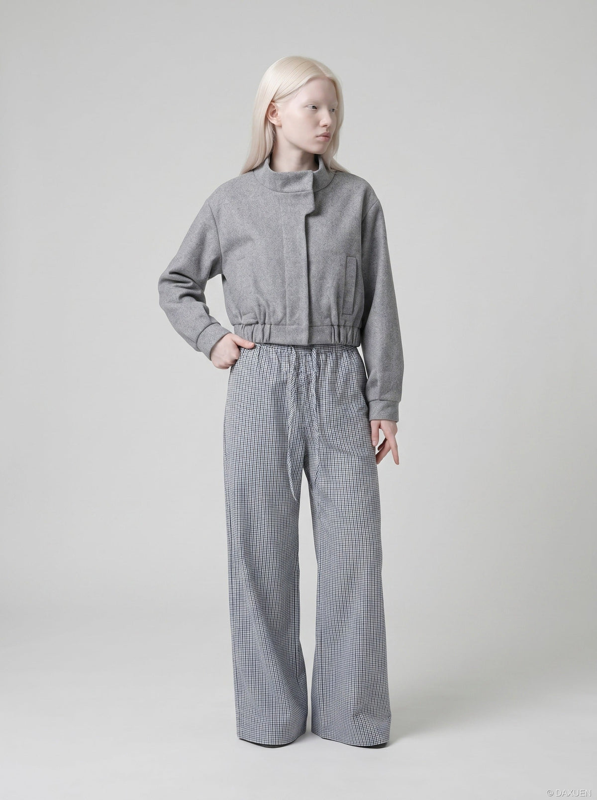DAXUEN Wide-leg gingham pants with elastic waistband — model photo