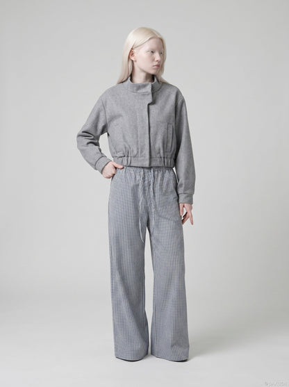 DAXUEN Wide-leg gingham pants with elastic waistband — model photo