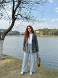 DAXUEN Wide-leg gingham pants with elastic waistband — model photo