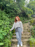 DAXUEN Wide-leg gingham pants with elastic waistband — model photo