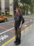 DAXUEN washed black city skyline graphic oversized T-shirt — model photo
