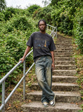 DAXUEN washed black city skyline graphic oversized T-shirt — model photo