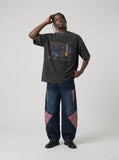 DAXUEN washed black city skyline graphic oversized T-shirt — model photo