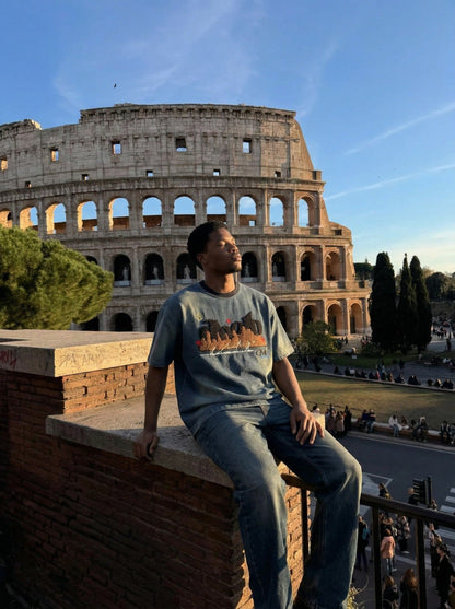 DAXUEN Embroidered denim t-shirt with cityscape design — model photo