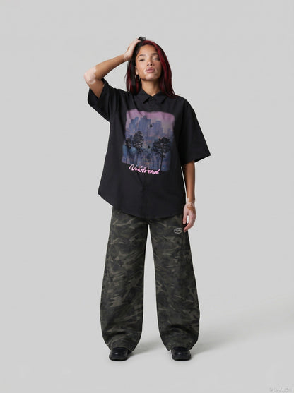 DAXUEN Short-sleeved button-up casual shirt with cityscape graphic — model photo