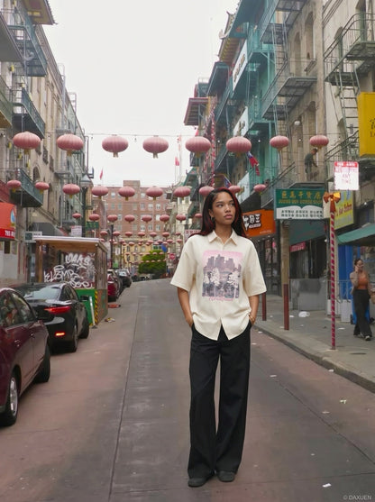 DAXUEN Short-sleeved button-up casual shirt with cityscape graphic — model photo
