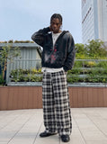 DAXUEN black and white plaid wide-leg trousers — model photo