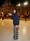 DAXUEN black and white plaid wide-leg trousers — model photo