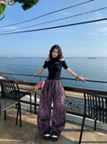 DAXUEN Cold-shoulder slim-fit knit top — model photo